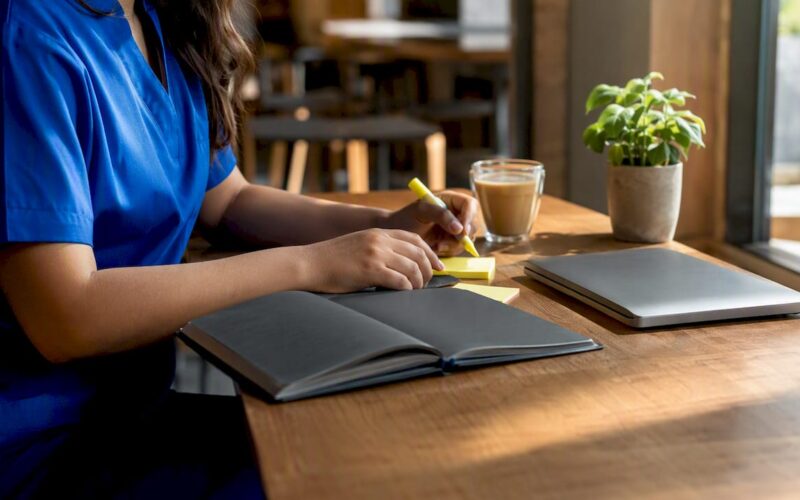 Study desk with nursing exam prep items
